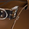 Μεγάλη δερμάτινη τσάντα Prada με αγκράφα και ζώνη με καρφιά Μεγάλη δερμάτινη τσάντα Prada με αγκράφα και ζώνη με καρφιά