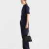 Μεσαία δερμάτινη τσάντα Prada Passage με πτερύγιο από Re-Nylon Μεσαία δερμάτινη τσάντα Prada Passage με πτερύγιο από Re-Nylon