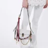 Μικρή δερμάτινη τσάντα ώμου Prada Soft με διακοσμητικά στοιχεία Μικρή δερμάτινη τσάντα ώμου Prada Soft με διακοσμητικά στοιχεία
