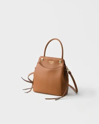 Μικρή δερμάτινη τσάντα Prada Carry