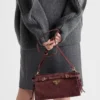 Μικρή τσάντα ώμου Prada Bonnie από σουέτ Μικρή τσάντα ώμου Prada Bonnie από σουέτ