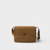 Μικρή τσάντα ώμου Prada Traveller με επένδυση από Re-Nylon Μικρή τσάντα ώμου Prada Traveller με επένδυση από Re-Nylon