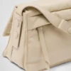 Μικρή τσάντα ώμου Prada Traveller με επένδυση από Re-Nylon Μικρή τσάντα ώμου Prada Traveller με επένδυση από Re-Nylon