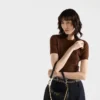 Μίνι δερμάτινη τσάντα Prada Re-Edition Μίνι δερμάτινη τσάντα Prada Re-Edition