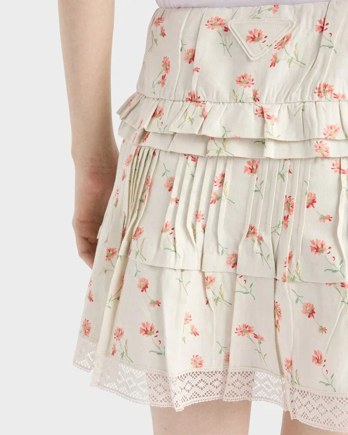 Μίνι φούστα από λινό με floral print Μίνι φούστα από λινό με floral print