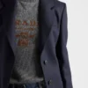 Πουλόβερ με λαιμόκοψη και λογότυπο Prada από κασμίρ και μαλλί Πουλόβερ με λαιμόκοψη και λογότυπο Prada από κασμίρ και μαλλί
