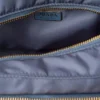 Prada Explore Μεσαία τσάντα ώμου από Re-Nylon με πτερύγιο