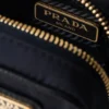 Prada Re-Edition 1978 Re-Nylon Mini-Pouch με μπρελόκ Prada Re-Edition 1978 Re-Nylon Mini-Pouch με μπρελόκ