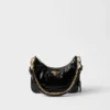 Τσάντα Prada Re-Edition Mini Naplak από λουστρίνι Τσάντα Prada Re-Edition Mini Naplak από λουστρίνι