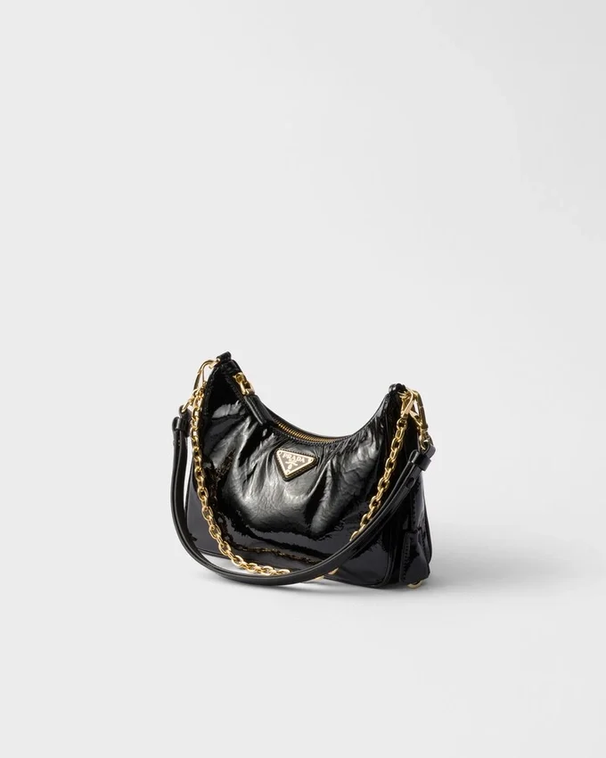 Τσάντα Prada Re-Edition Mini Naplak από λουστρίνι Τσάντα Prada Re-Edition Mini Naplak από λουστρίνι