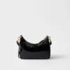 Τσάντα Prada Re-Edition Mini Naplak από λουστρίνι Τσάντα Prada Re-Edition Mini Naplak από λουστρίνι