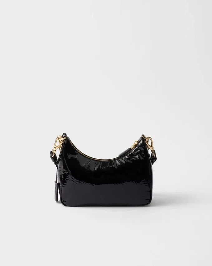 Τσάντα Prada Re-Edition Mini Naplak από λουστρίνι Τσάντα Prada Re-Edition Mini Naplak από λουστρίνι