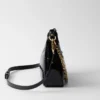 Τσάντα Prada Re-Edition Mini Naplak από λουστρίνι Τσάντα Prada Re-Edition Mini Naplak από λουστρίνι