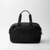 Τσάντα ταξιδίου από Re-Nylon και δέρμα Saffiano Τσάντα ταξιδίου από Re-Nylon και δέρμα Saffiano