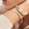Βραχιόλι Eternal Gold Snake σε κίτρινο χρυσό και διαμάντια Βραχιόλι Eternal Gold Snake σε κίτρινο χρυσό και διαμάντια